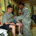 Combat Medic Tends to Soldier at Patrol Base Yusifiyah