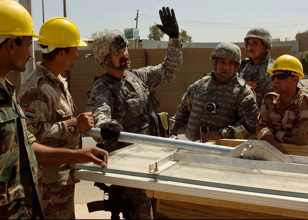 U.S. Soldiers Assist Iraqi Army in Installing Solar-Powered Street Lights Across Baghdad