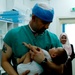 Army Nurse Carries Iraqi Child to Life-Saving Surgery