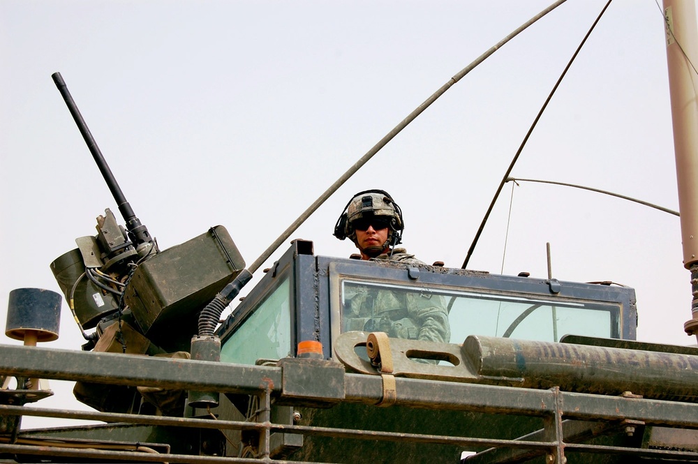 Puerto Rican Soldier Mans .50-Caliber Machine Gun on Iraq Patrol