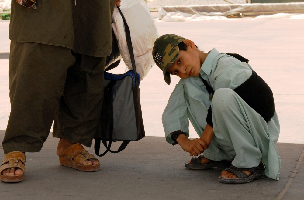 Afghan Boy Reunited with Family After Cancer Treatment at U.S. Military Hospital