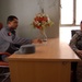Afghan Police Commander Meets with U.S. Army Mentor in Kandahar