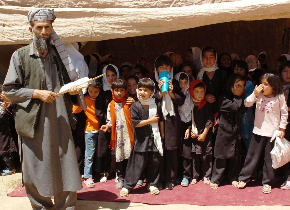 Afghan Teacher Celebrates Opening of New All-Girls School with Students and U.S. Soldiers