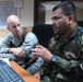 U.S. Air Force Officer Advises Iraqi Counterpart on Air Operations Center Logistics