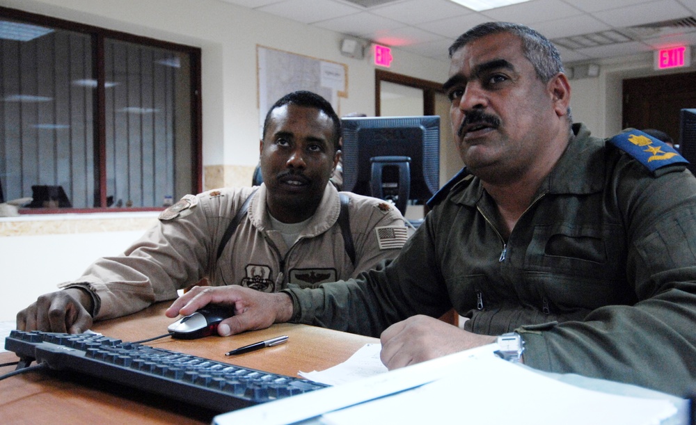 U.S. Air Force Officer Advises Iraqi Counterpart on Air Operations