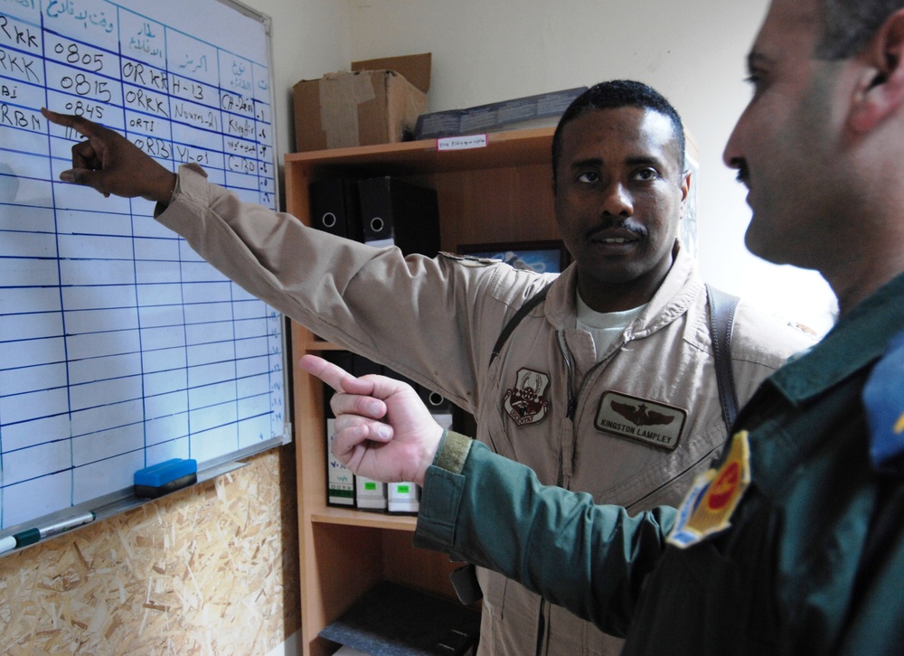 U.S. Air Force Advisor Assists Iraqi Air Operations Center Officer