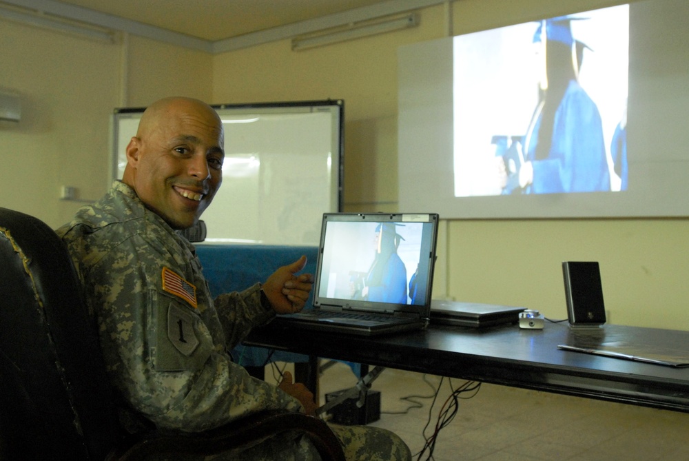 Soldier Watches Daughter's Graduation Ceremony from Iraq