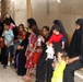 Iraqi Families Receive Aid at Radwaniyah Palace Complex