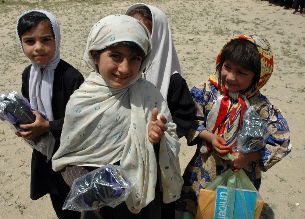 Afghan Children Receive Donated Shoes from U.S. Servicemembers