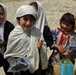 Afghan Children Receive Donated Shoes from U.S. Servicemembers