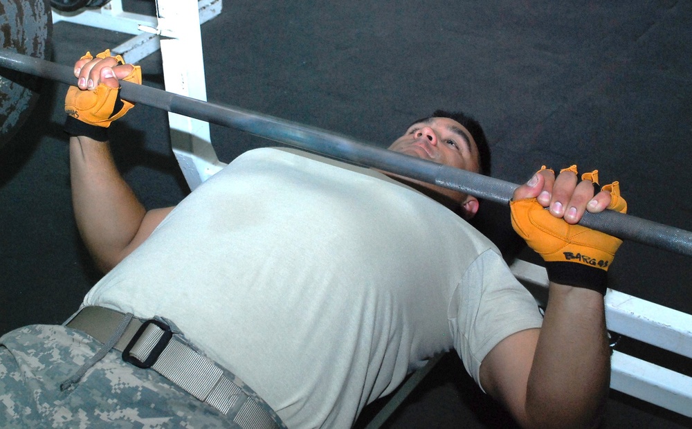 Army Sgt. Lifts Weights at Camp Liberty Gym in Iraq