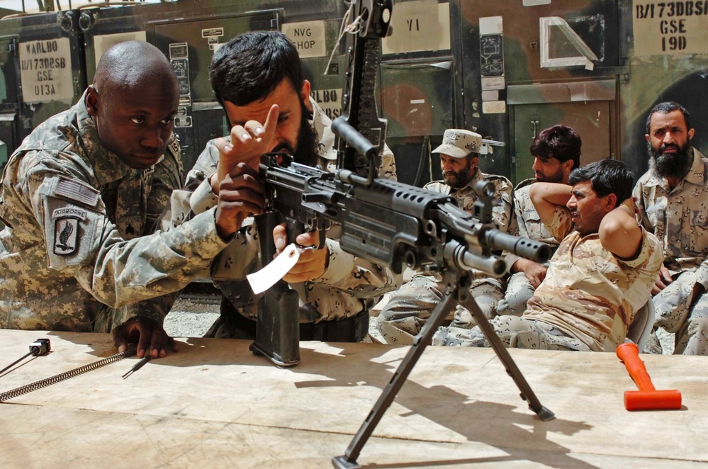 U.S. Soldier Trains Afghan Border Police on Weapons Maintenance