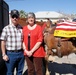 Grieving Parents Honor Fallen Son in Homecoming Parade