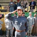 Afghan Police Graduate Salutes Dignitaries at Kabul Ceremony