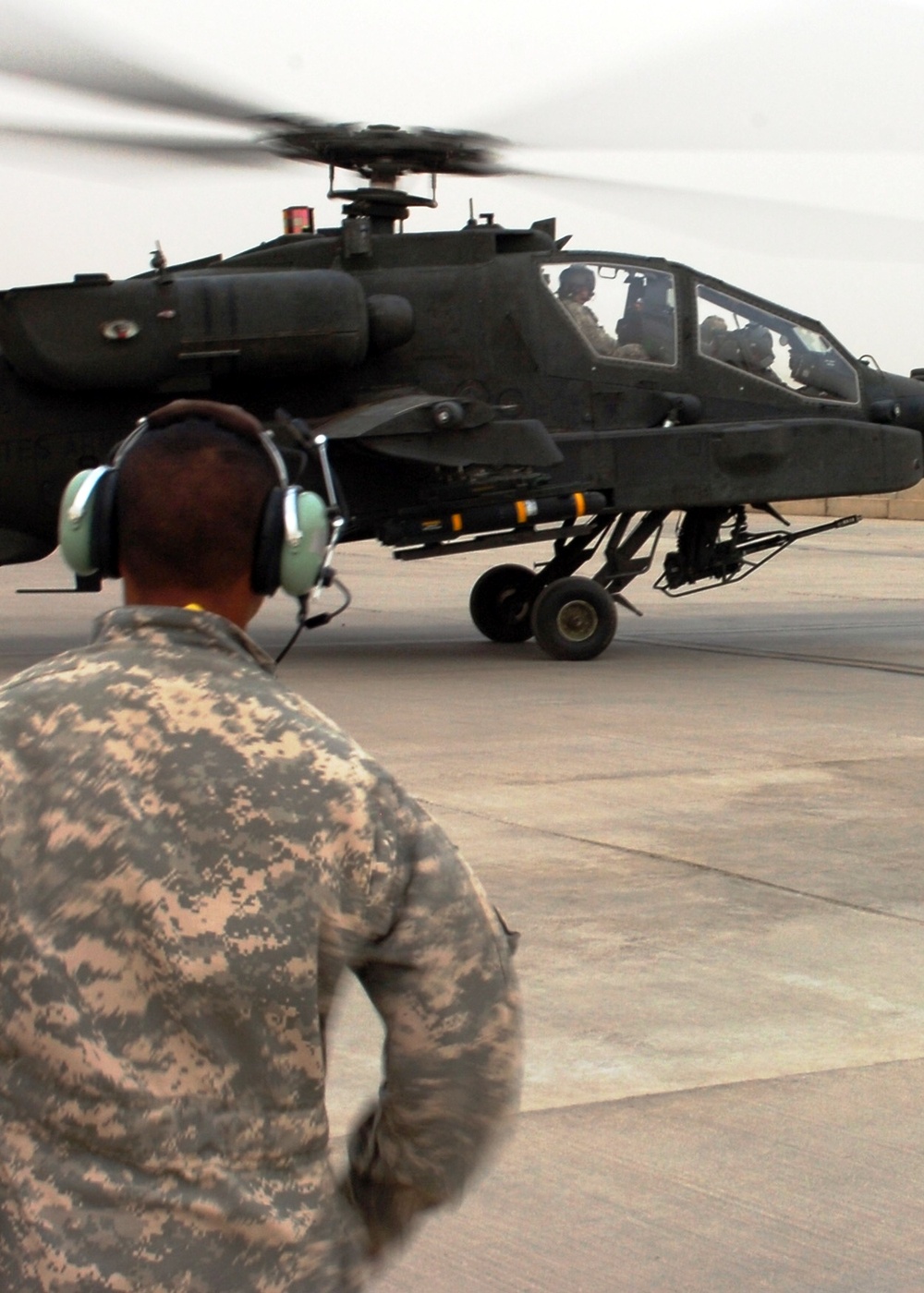 Apache Mechanics Prepare for Night Mission in Baghdad