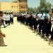 Iraqi Police Recruits Demonstrate Riot Control at Graduation Ceremony