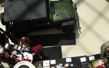 Chrysler Employees Pack Care Packages for Deployed Troops