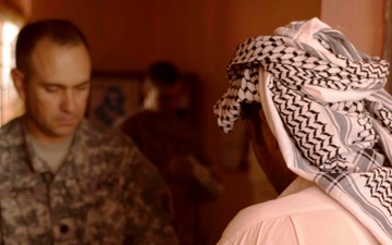 U.S. Army Officer Provides Medical Assistance to Iraqi Villager