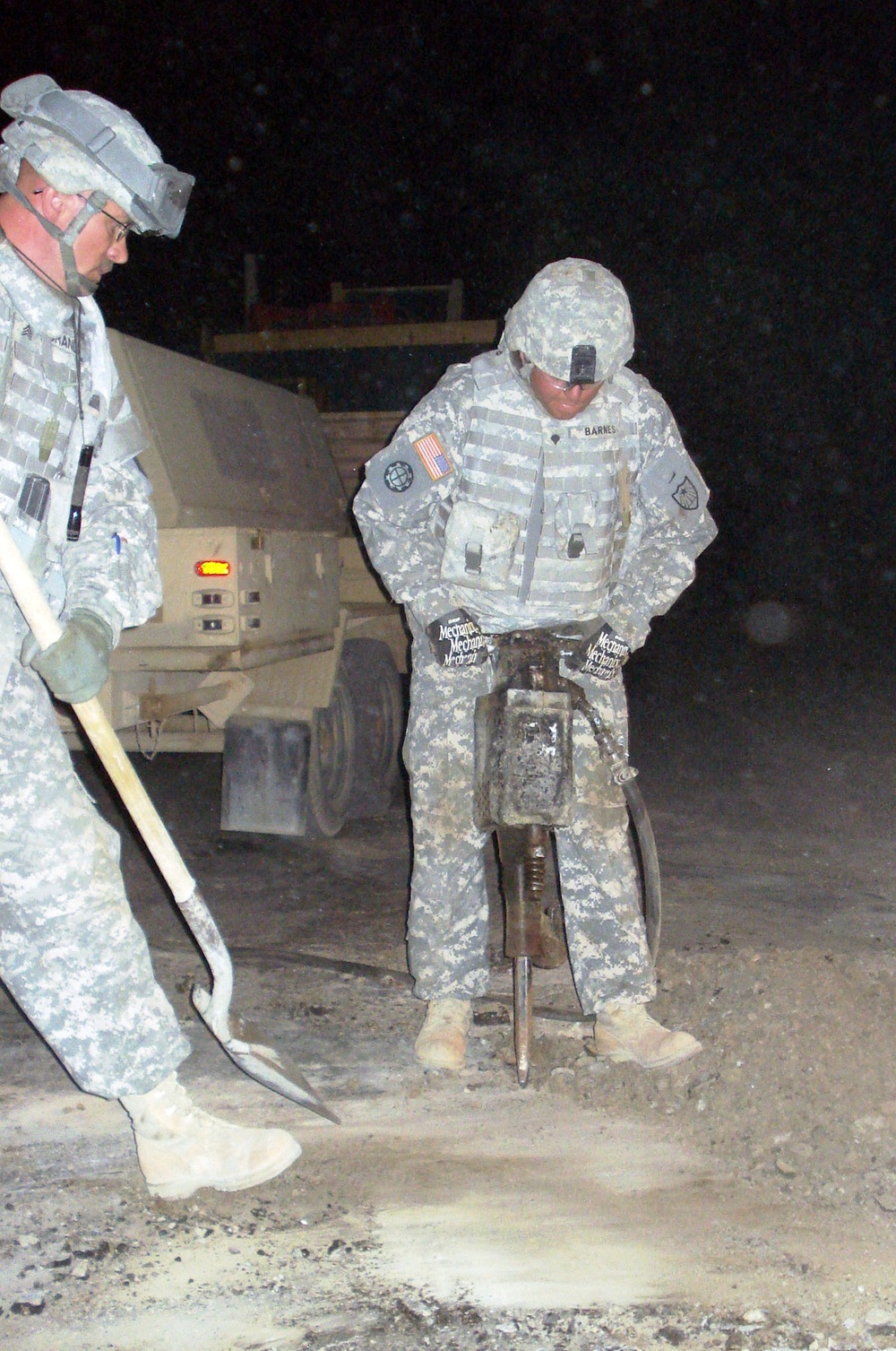 Army Spc. Performs Rapid Crater Repair in Baghdad