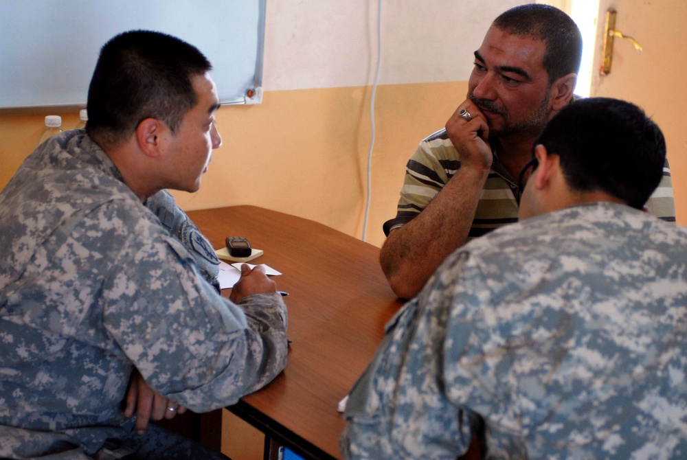 Army Spc. Helps Iraqi Man File Damage Claim After Clashes in Sadr City