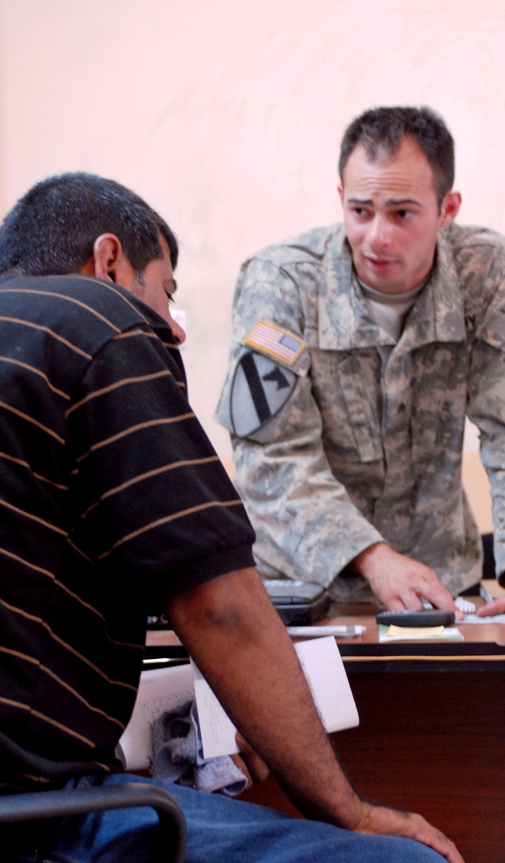Army Sgt. Helps Iraqi Citizens File Claims for Damages in Sadr City