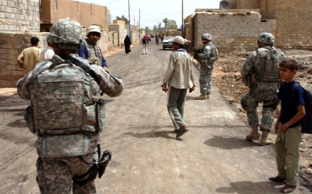Soldiers Patrol Refurbished Road in Musayyib, Iraq