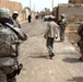 Soldiers Patrol Refurbished Road in Musayyib, Iraq