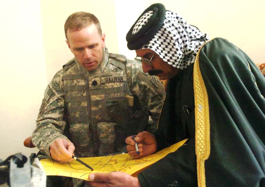 Army Officer Discusses Security with Iraqi Leader Before Providing Water to Village