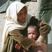 Afghan Woman and Child Receive Care at Navy-Led Outreach Clinic