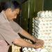 Iraqi Worker Tends to Chicken Eggs at Hatchery in Mahmudiyah