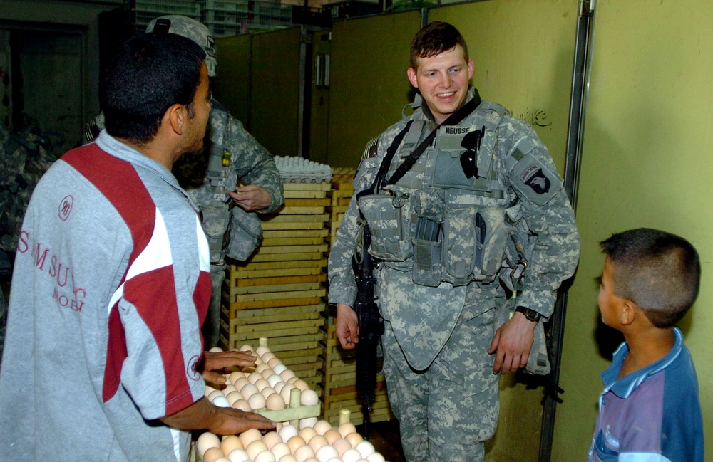 Chicken Hatchery Worker Prepares Eggs for Incubation in Mahmudiyah, Iraq