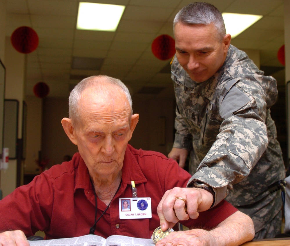 Senior Enlisted Advisor Honors Retiree During Surprise Visit
