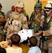 Iraqi Soldiers Hand Out Toys to Children in Sab Al Bour