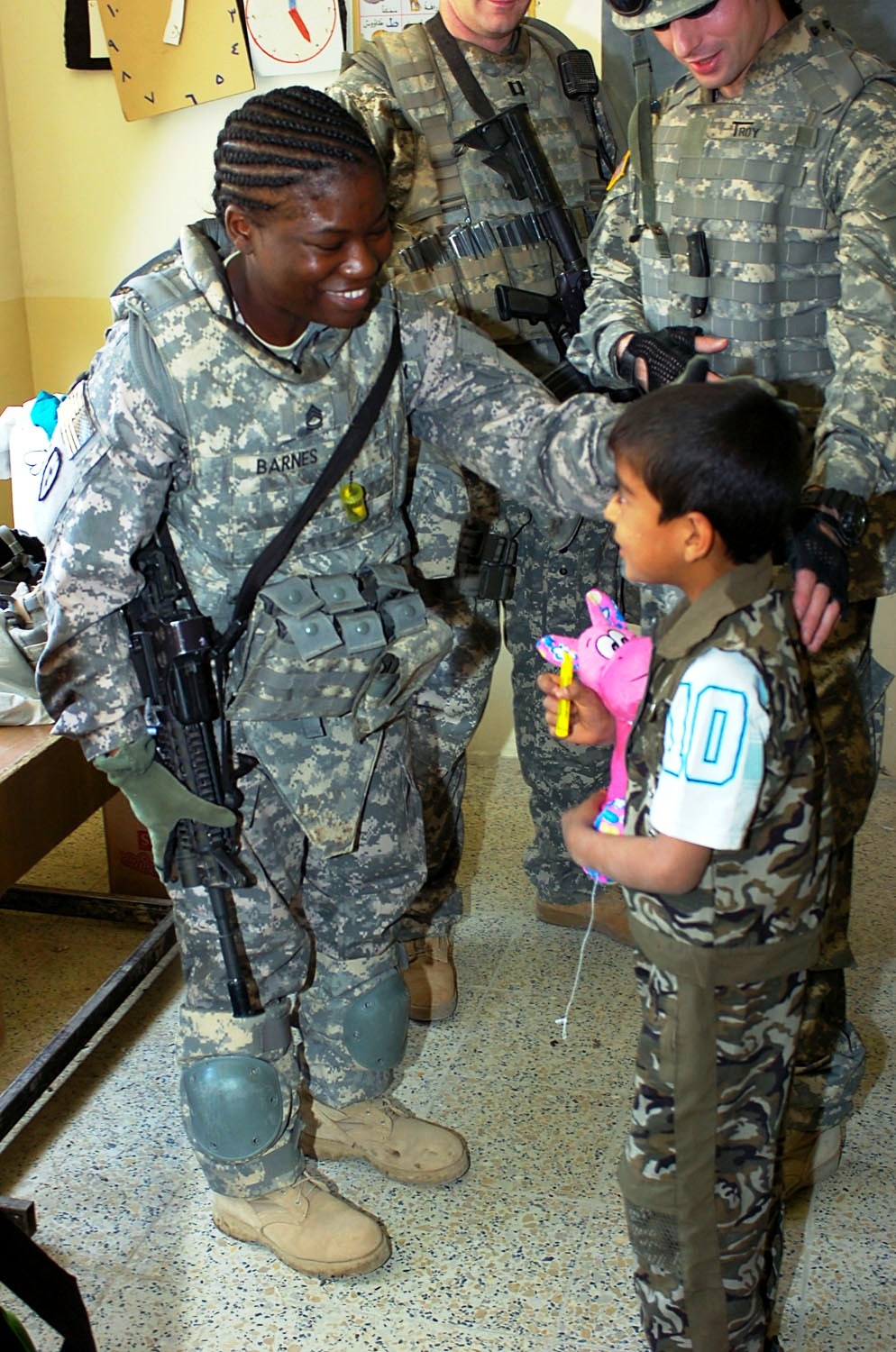 Army Sergeant Distributes School Supplies to Iraqi Children