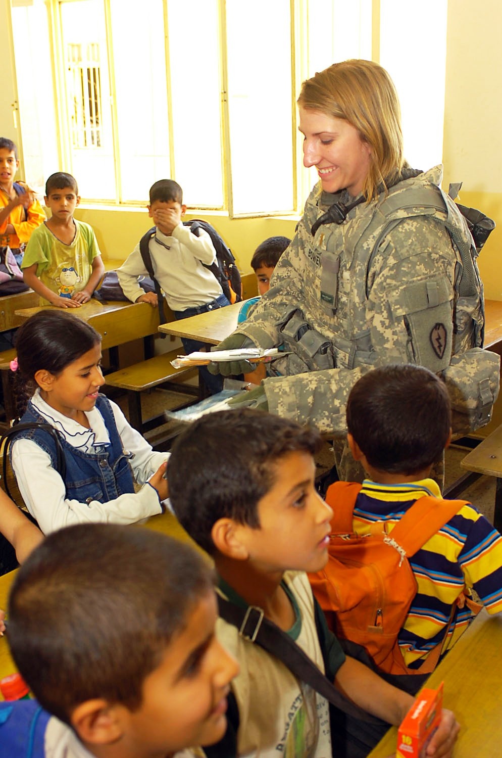 U.S. Army Officer Distributes School Supplies to Iraqi Students