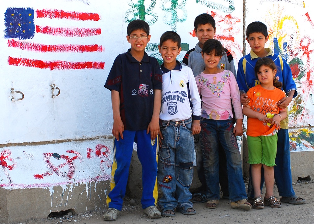 Young Iraqi Artists Paint T-Walls at Forward Operating Base