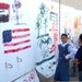 Iraqi Children Celebrate with Art and Flags at Forward Operating Base