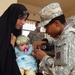 Army Medic Provides Care to Iraqi Infant During Civil Action Program