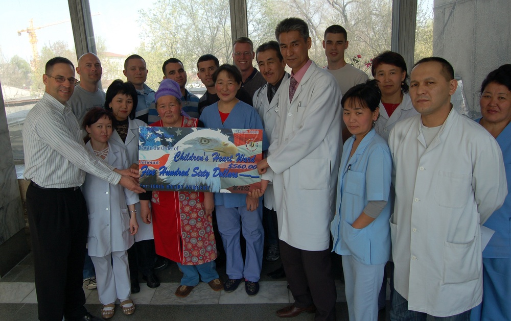 Air Force Chaplain and Airmen Celebrate 100th Heart Surgery at Children's Ward