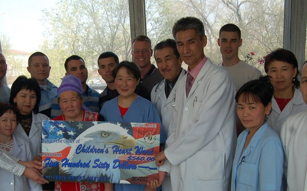 Air Force Chaplain and Airmen Celebrate 100th Heart Surgery at Children's Ward