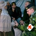Swedish Army Officer Provides Medical Care to Afghan Elder