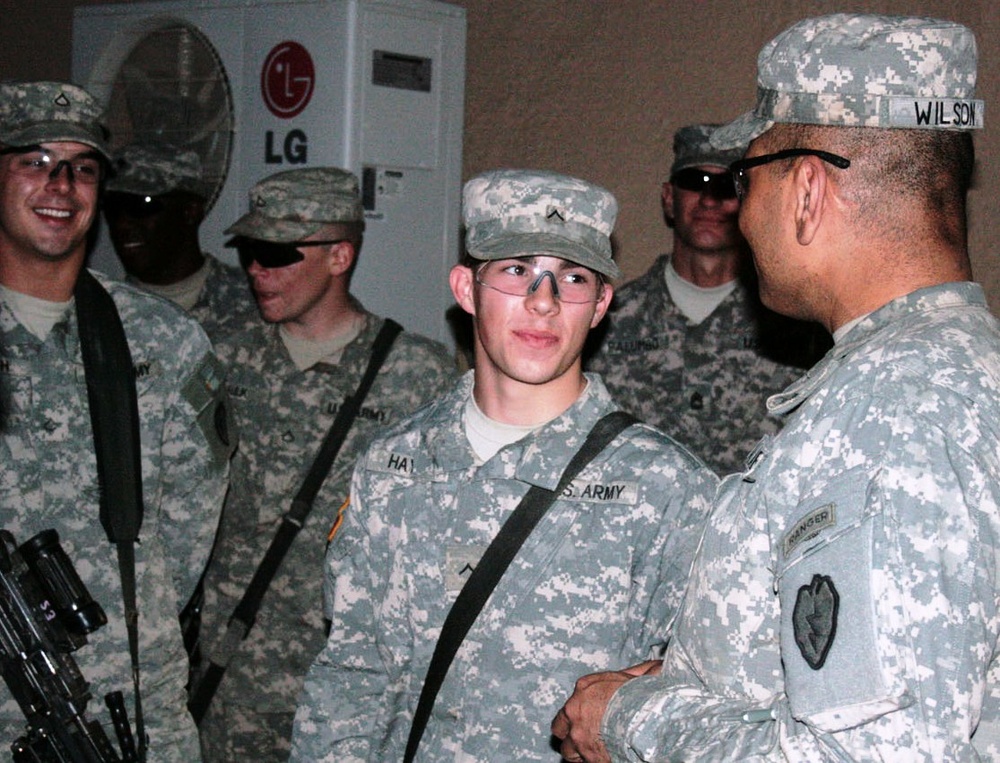 Soldier Receives Commander's Coin for Excellence in Iraq