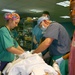 U.S. Military Doctors Treat Iraqi Teen Injured by IED