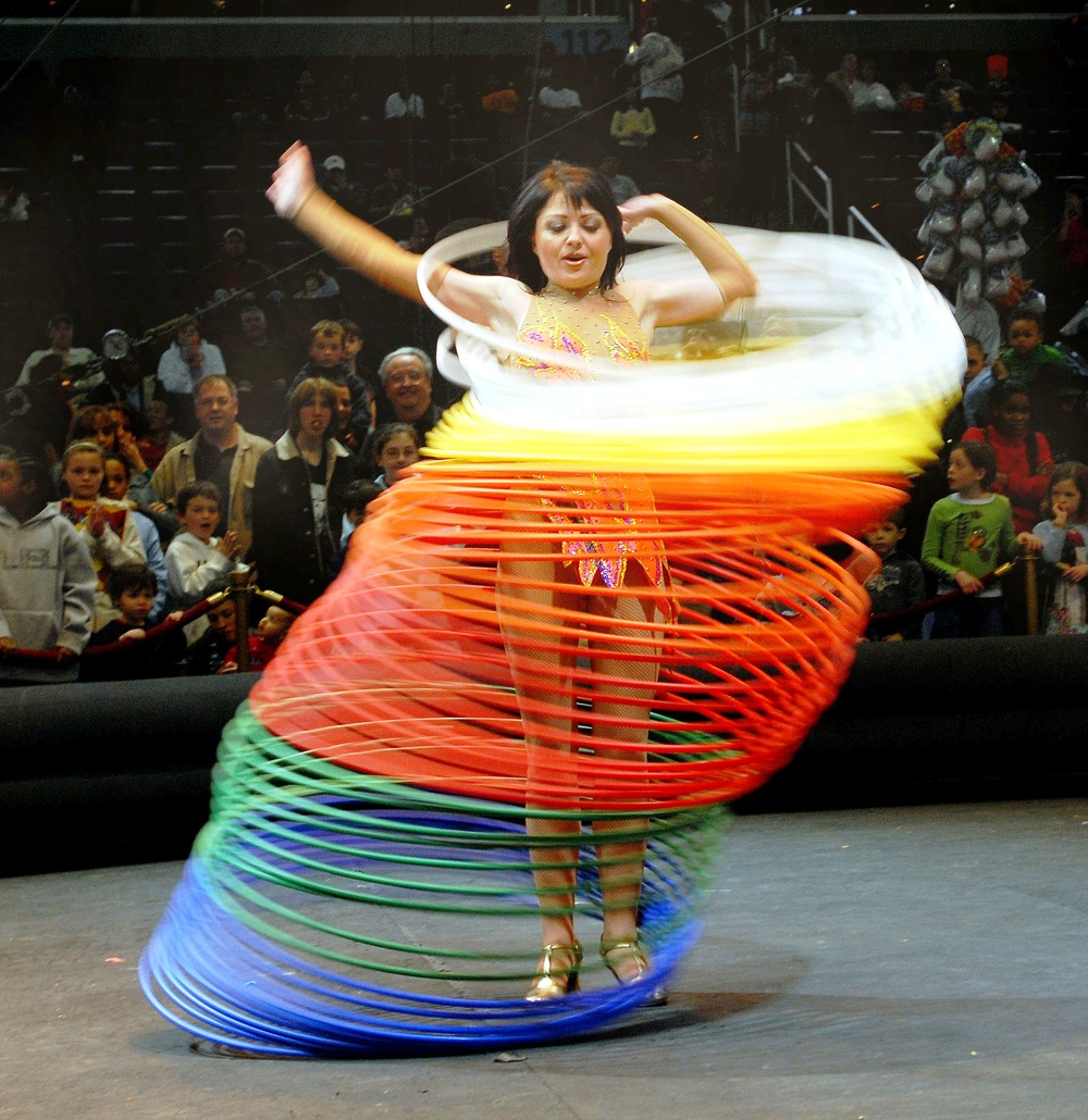 Circus Performer Spins 60 Hula Hoops Simultaneously