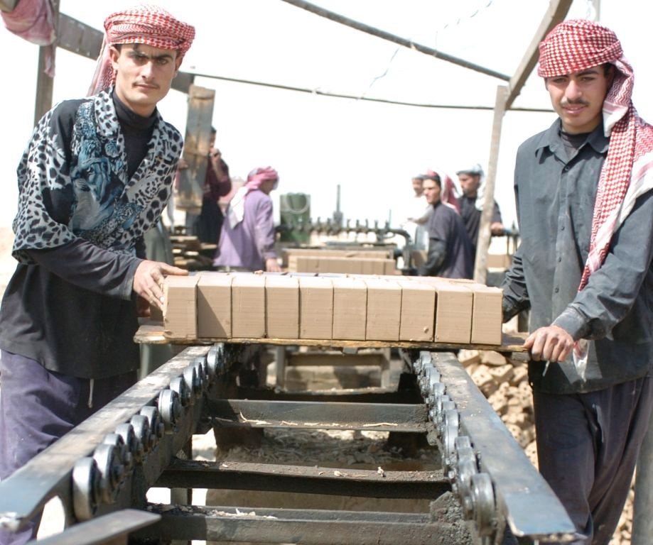 Brick Factory Workers in Iraq Toil with Donkey-Drawn Carts