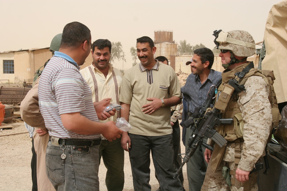 Navy Officer Delivers Protective Gear to Iraqi Oil Workers