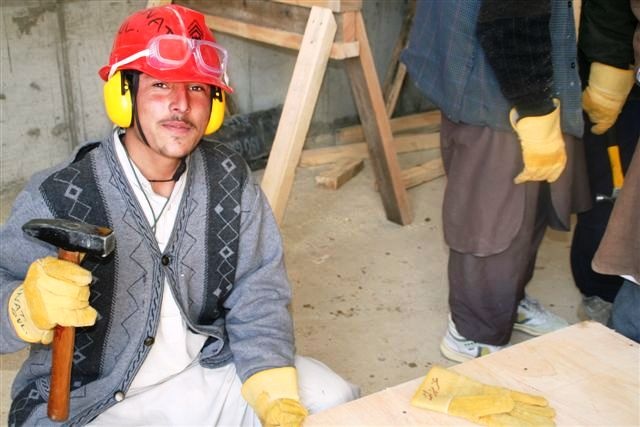 Afghan Man Builds Tool Shed at Forward Operating Base in Paktika