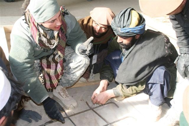 U.S. Soldiers Teach Afghan Men Construction Skills at Forward Operating Base