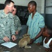 Veterinarian Inoculates Puppy Belonging to Liberian Man