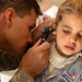 Army Medic Provides Care to Iraqi Girl During Combined Mission